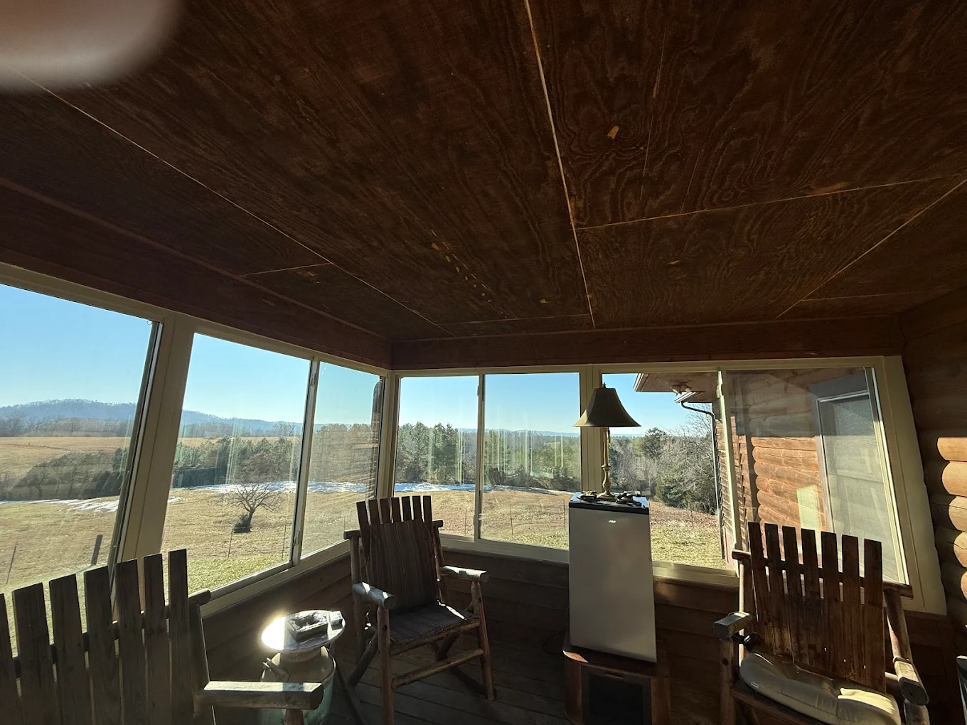 Enclosed porch windows with mountain view
